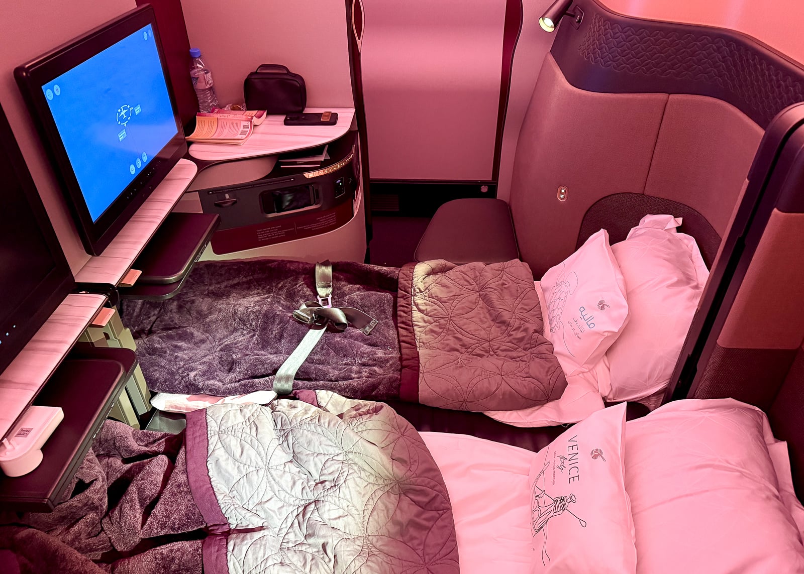 Qatar Business Class Q Suites flying Qatar Q Suites with points