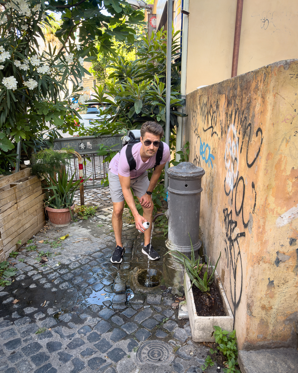 water fountain Rome Italy travel europe on a budget